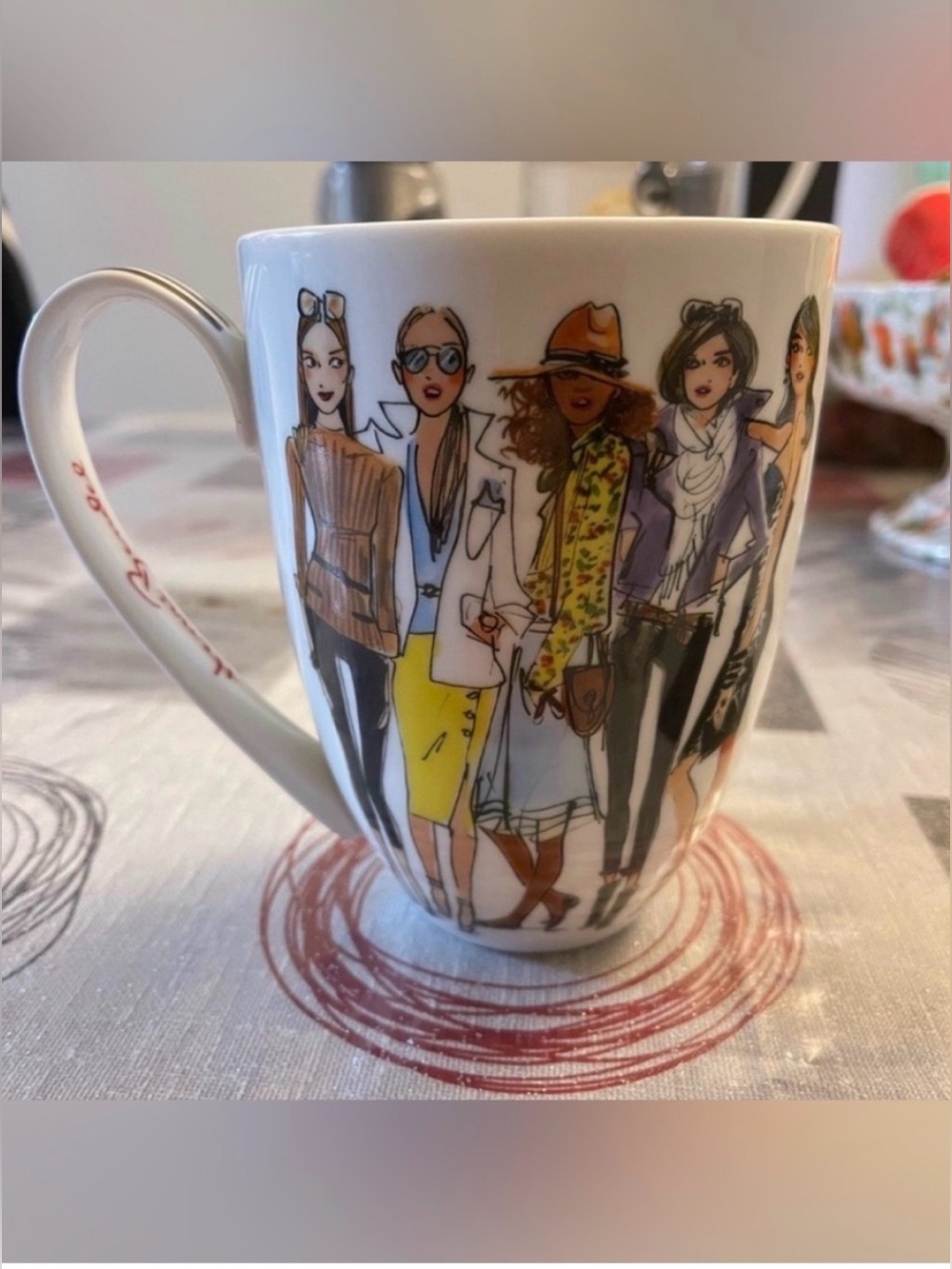 New Henri Bendel mug featuring the iconic "Bendel Girls" fashion illustrations.